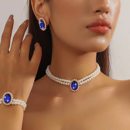 Ensemble de Bijoux Élégant en Perles et Strass: Collier, Bracelet et Boucles d'Oreilles